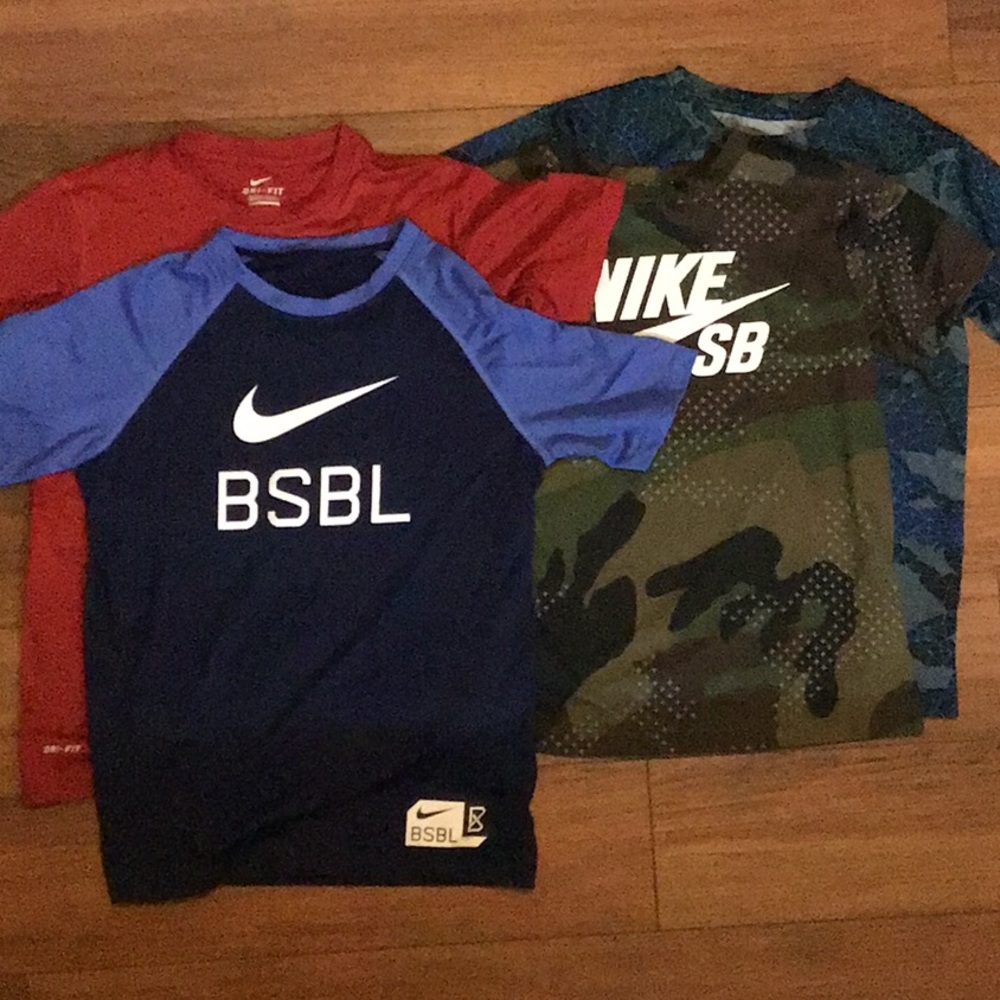 Four Nike dri-fit tees.